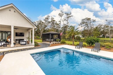 This home is located in the Hampton Point Subdivision. This on The King and Prince Golf Course, Home of the Hampton Club in Georgia - for sale on GolfHomes.com, golf home, golf lot