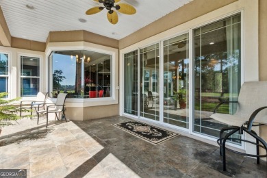 Enjoy serene views of the marsh and the golf course in this on The Club At Osprey Cove in Georgia - for sale on GolfHomes.com, golf home, golf lot