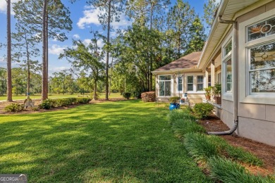 Enjoy serene views of the marsh and the golf course in this on The Club At Osprey Cove in Georgia - for sale on GolfHomes.com, golf home, golf lot