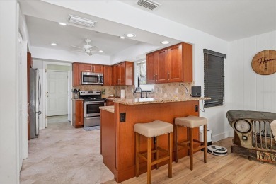 Under contract-accepting backup offers. Discover this on Sarasota Golf Club in Florida - for sale on GolfHomes.com, golf home, golf lot