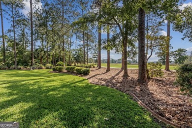 Enjoy serene views of the marsh and the golf course in this on The Club At Osprey Cove in Georgia - for sale on GolfHomes.com, golf home, golf lot