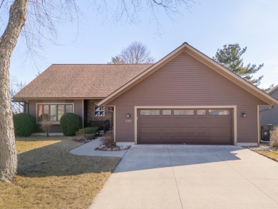 This custom-built home sits on the edge of Walter's Ridge golf on Pheasant Ridge Municipal Golf Course in Iowa - for sale on GolfHomes.com, golf home, golf lot