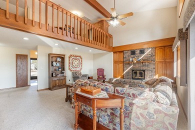 This custom-built home sits on the edge of Walter's Ridge golf on Pheasant Ridge Municipal Golf Course in Iowa - for sale on GolfHomes.com, golf home, golf lot