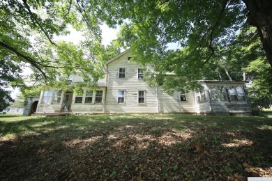 Potential abounds with this old farmhouse. Situated on a on Olde Kinderhook Golf Club in New York - for sale on GolfHomes.com, golf home, golf lot