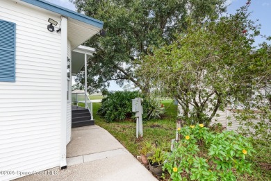 This charming park model home in The Great Outdoors RV  Golf on The Great Outdoors Golf and Country Club in Florida - for sale on GolfHomes.com, golf home, golf lot