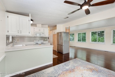 This charming park model home in The Great Outdoors RV  Golf on The Great Outdoors Golf and Country Club in Florida - for sale on GolfHomes.com, golf home, golf lot