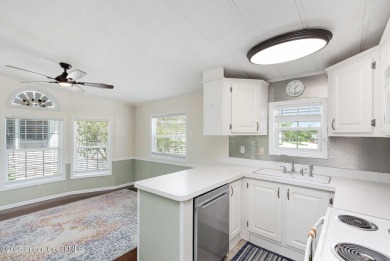 This charming park model home in The Great Outdoors RV  Golf on The Great Outdoors Golf and Country Club in Florida - for sale on GolfHomes.com, golf home, golf lot