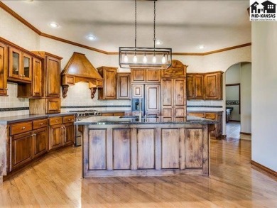 We are pleased to offer this beautiful one-owner, custom built on Highlands Golf and Supper Club in Kansas - for sale on GolfHomes.com, golf home, golf lot