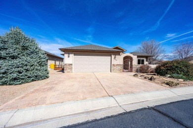 Charming Redlands Home with Stunning Monument Views! Nestled in on Tiara Rado Golf Course in Colorado - for sale on GolfHomes.com, golf home, golf lot