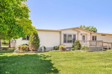 This well-maintained 4-bedroom, 2-bath double wide offers on Bill Roberts Municipal Golf Course in Montana - for sale on GolfHomes.com, golf home, golf lot