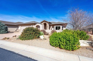 Charming Redlands Home with Stunning Monument Views! Nestled in on Tiara Rado Golf Course in Colorado - for sale on GolfHomes.com, golf home, golf lot