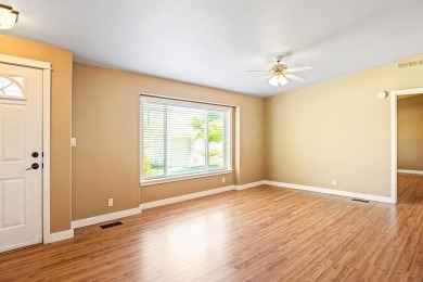 This well-maintained 4-bedroom, 2-bath double wide offers on Bill Roberts Municipal Golf Course in Montana - for sale on GolfHomes.com, golf home, golf lot