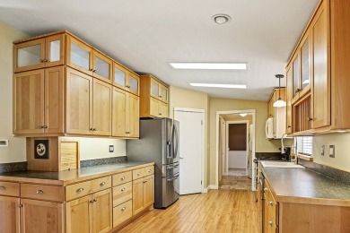 This well-maintained 4-bedroom, 2-bath double wide offers on Bill Roberts Municipal Golf Course in Montana - for sale on GolfHomes.com, golf home, golf lot