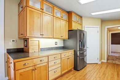 This well-maintained 4-bedroom, 2-bath double wide offers on Bill Roberts Municipal Golf Course in Montana - for sale on GolfHomes.com, golf home, golf lot
