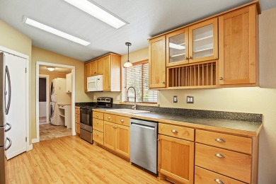 This well-maintained 4-bedroom, 2-bath double wide offers on Bill Roberts Municipal Golf Course in Montana - for sale on GolfHomes.com, golf home, golf lot