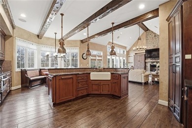 Experience luxury living in this stunning 1.5-story home on The Deuce At the National Golf Club of Kansas City in Missouri - for sale on GolfHomes.com, golf home, golf lot