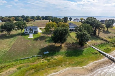 Come enjoy this beautiful waterfront property located in the on Cedar Creek Country Club in Texas - for sale on GolfHomes.com, golf home, golf lot