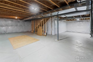 Stunning 2-story corner-lot in the heart of Windsor's on Raindance National Golf Course in Colorado - for sale on GolfHomes.com, golf home, golf lot