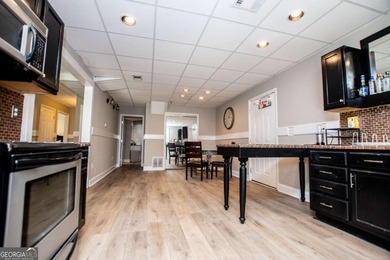 So much for your money, golf course, partially finished basement on Oak Mountain Championship Golf Club in Georgia - for sale on GolfHomes.com, golf home, golf lot