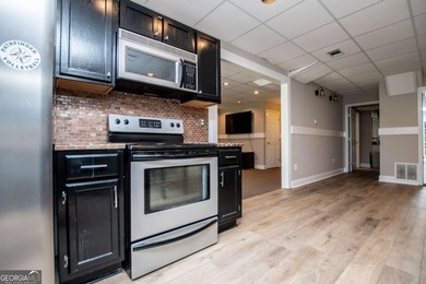 So much for your money, golf course, partially finished basement on Oak Mountain Championship Golf Club in Georgia - for sale on GolfHomes.com, golf home, golf lot