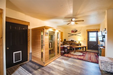 Beautiful rustic log home with modern comforts perfectly on Red Lodge Golf Club in Montana - for sale on GolfHomes.com, golf home, golf lot