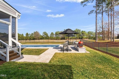 Very rare opportunity to experience resort-style living in this on Hasentree Club in North Carolina - for sale on GolfHomes.com, golf home, golf lot