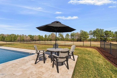 Very rare opportunity to experience resort-style living in this on Hasentree Club in North Carolina - for sale on GolfHomes.com, golf home, golf lot