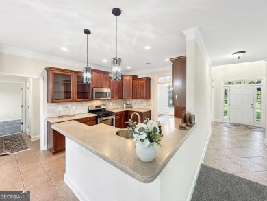 Premier Lake & Golf Living! Welcome to this beautifully on Canongate At Georgia National Golf Club in Georgia - for sale on GolfHomes.com, golf home, golf lot