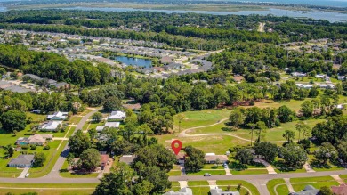 Charming 3BR/2BA concrete block home on the 8th tee of the St on St. Augustine Shores Golf Club in Florida - for sale on GolfHomes.com, golf home, golf lot