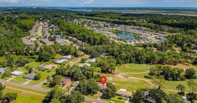 Charming 3BR/2BA concrete block home on the 8th tee of the St on St. Augustine Shores Golf Club in Florida - for sale on GolfHomes.com, golf home, golf lot