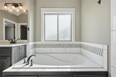 Simply the best! This former JFE Construction Model is a must on Golf Club of Creekmoor in Missouri - for sale on GolfHomes.com, golf home, golf lot