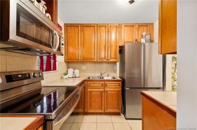 This cozy condo offers everything you need for Florida living on Monterey Yacht and Country Club in Florida - for sale on GolfHomes.com, golf home, golf lot