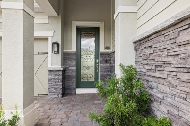 Stunning Single-Story Home on Premier Lot in Mallory Park at on Esplanade Golf and Country at Lakewood Ranch in Florida - for sale on GolfHomes.com, golf home, golf lot