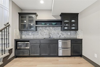 Simply the best! This former JFE Construction Model is a must on Golf Club of Creekmoor in Missouri - for sale on GolfHomes.com, golf home, golf lot