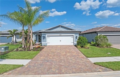 Move-in ready and located in the highly desirable gated on Valencia Golf and Country Club in Florida - for sale on GolfHomes.com, golf home, golf lot