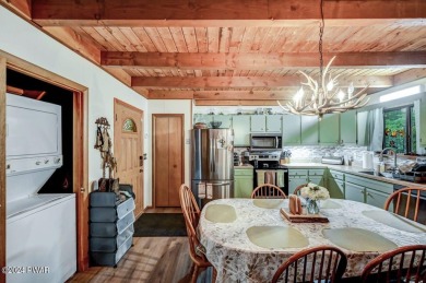 Step into tranquility with this furnished charming three bedroom on The Hideout Golf in Pennsylvania - for sale on GolfHomes.com, golf home, golf lot