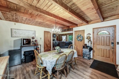 Step into tranquility with this furnished charming three bedroom on The Hideout Golf in Pennsylvania - for sale on GolfHomes.com, golf home, golf lot