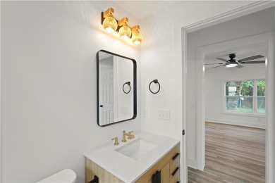 This beautifully renovated home feels just like new construction on Sea Palms Golf and Tennis Resort in Georgia - for sale on GolfHomes.com, golf home, golf lot