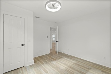 This beautifully renovated home feels just like new construction on Sea Palms Golf and Tennis Resort in Georgia - for sale on GolfHomes.com, golf home, golf lot