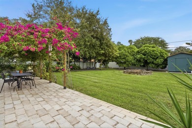 Very rarely does a home offer a sense of calm and harmony that on Miami Springs Golf and Country Club in Florida - for sale on GolfHomes.com, golf home, golf lot