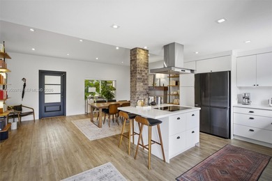 Very rarely does a home offer a sense of calm and harmony that on Miami Springs Golf and Country Club in Florida - for sale on GolfHomes.com, golf home, golf lot