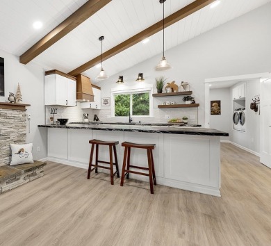 An exquisite Retreat at the Lake. Nestled in the prime location on Lake Almanor Country Club in California - for sale on GolfHomes.com, golf home, golf lot