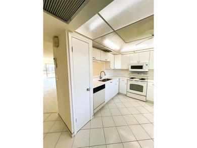 PENTHOUSE with Spectacular GOLF/WATER/FOUNTAIN/CLUBHOUSE VIEW on Wynmoor Golf Course in Florida - for sale on GolfHomes.com, golf home, golf lot