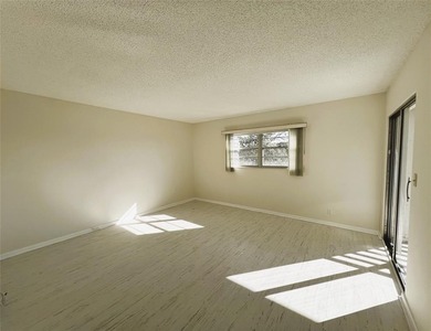 PENTHOUSE with Spectacular GOLF/WATER/FOUNTAIN/CLUBHOUSE VIEW on Wynmoor Golf Course in Florida - for sale on GolfHomes.com, golf home, golf lot