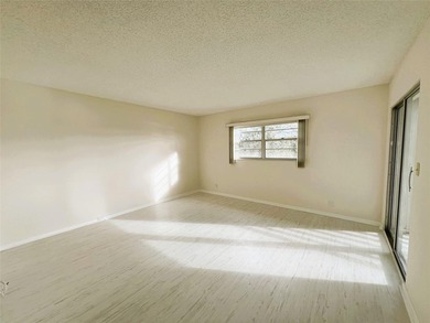 PENTHOUSE with Spectacular GOLF/WATER/FOUNTAIN/CLUBHOUSE VIEW on Wynmoor Golf Course in Florida - for sale on GolfHomes.com, golf home, golf lot