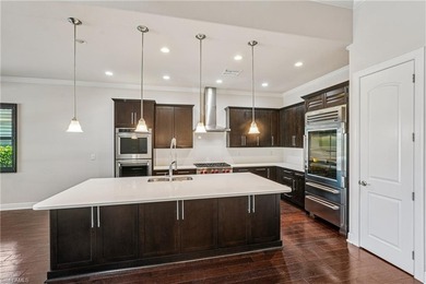 Welcome to a truly exceptional Toll Brothers residence in the on Spanish Wells Golf and Country Club in Florida - for sale on GolfHomes.com, golf home, golf lot