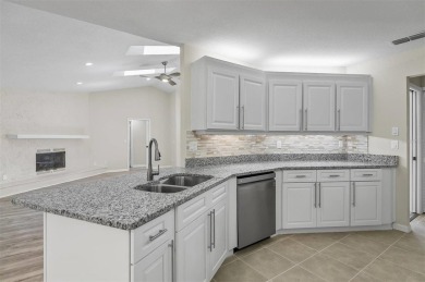 Light-Filled Designer Pool Home | New Roof | Gourmet Kitchen | on The Grand Club - Pine Lakes Course in Florida - for sale on GolfHomes.com, golf home, golf lot