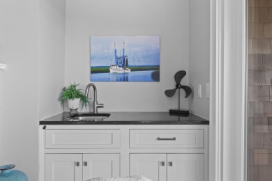 Step into refined coastal luxury at 4303 Windswept Villas, a on Kiawah Island Resort - Cougar Point in South Carolina - for sale on GolfHomes.com, golf home, golf lot