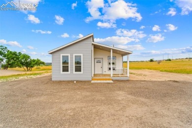 Experience modern country living with breathtaking mountain on Hollydot Golf Course in Colorado - for sale on GolfHomes.com, golf home, golf lot