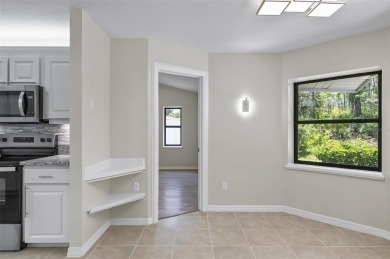 Light-Filled Designer Pool Home | New Roof | Gourmet Kitchen | on The Grand Club - Pine Lakes Course in Florida - for sale on GolfHomes.com, golf home, golf lot